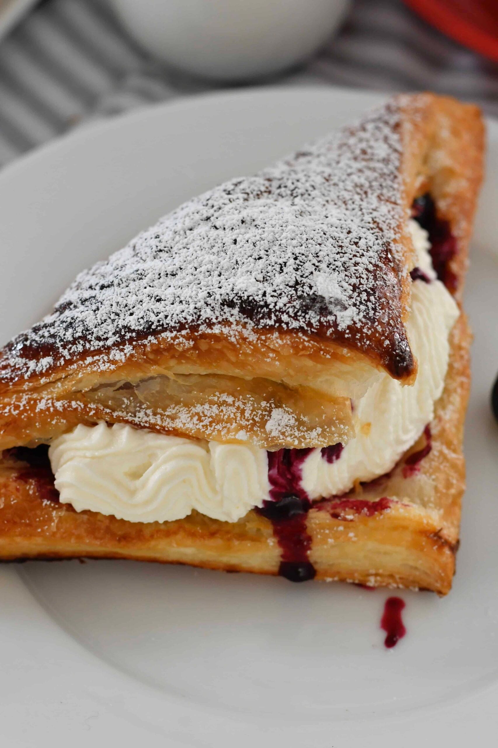 Pastry with Mascarpone Whipped Cream and Blueberry Sauce
