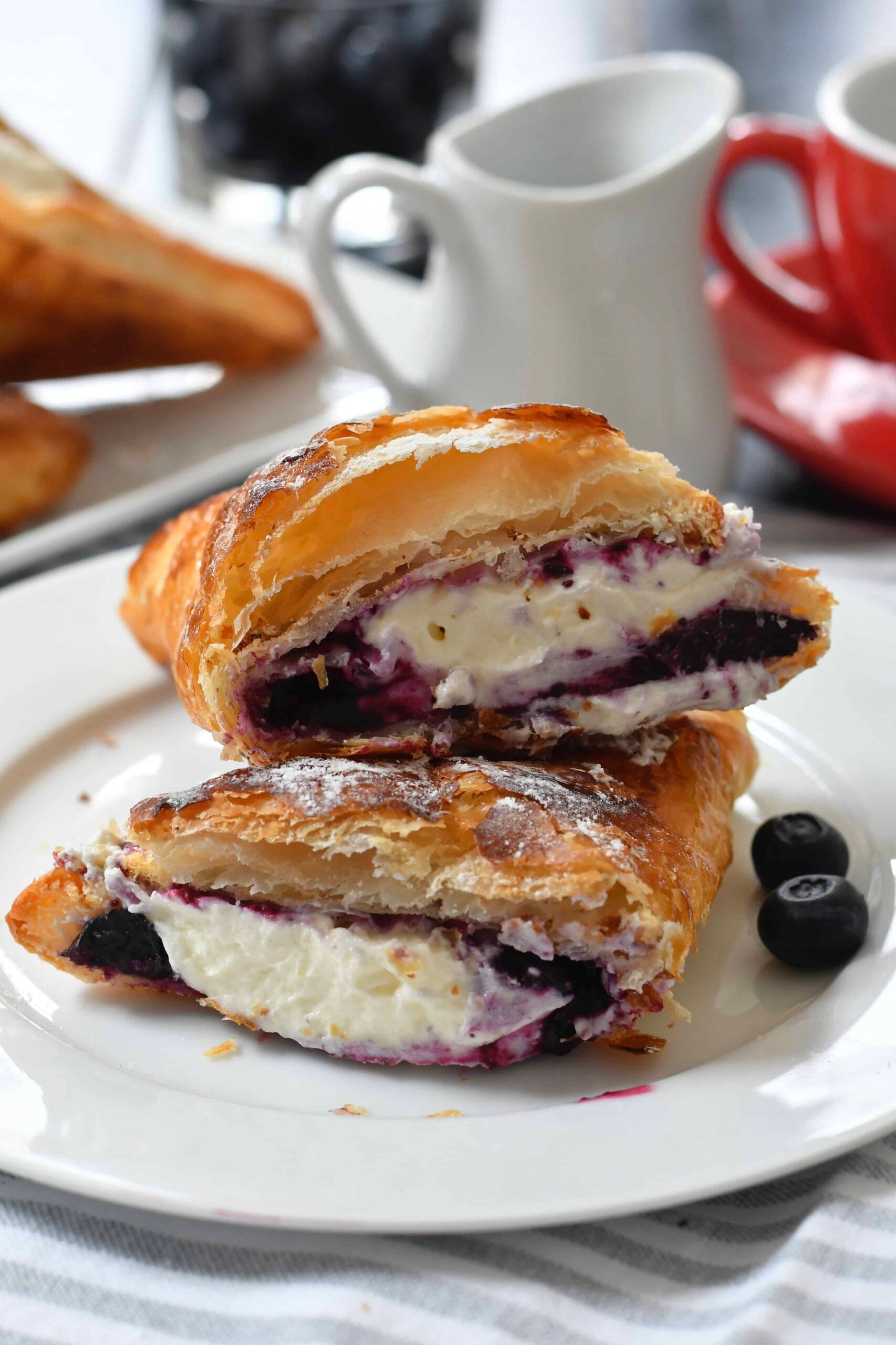 Pastry with Mascarpone Whipped Cream and Blueberry Sauce